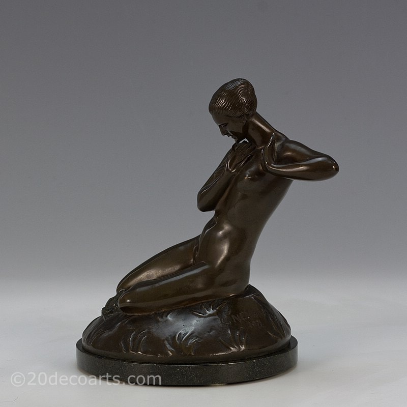  Carl Neuhaus - An Art Deco sculpture The Surprise, Germany, dated 1921 - the young woman with a frog at her knees 