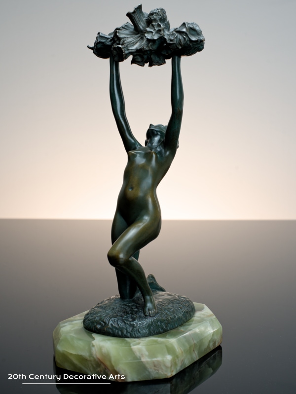   Art Deco bronze sculpture fpr sale circa 1930 the nude dancer holding aloft an abundance of flowers
