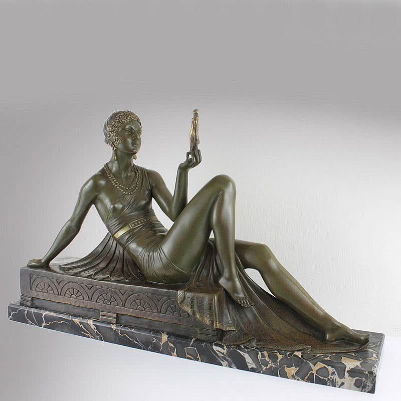 20th Century Decorative Arts |An extremely rare Art Deco  patinated silvered and gilded bronze sculpture by Joseph Emmanuel Descomps  circa 1925 titled "Comparison", edited by Etling -Paris